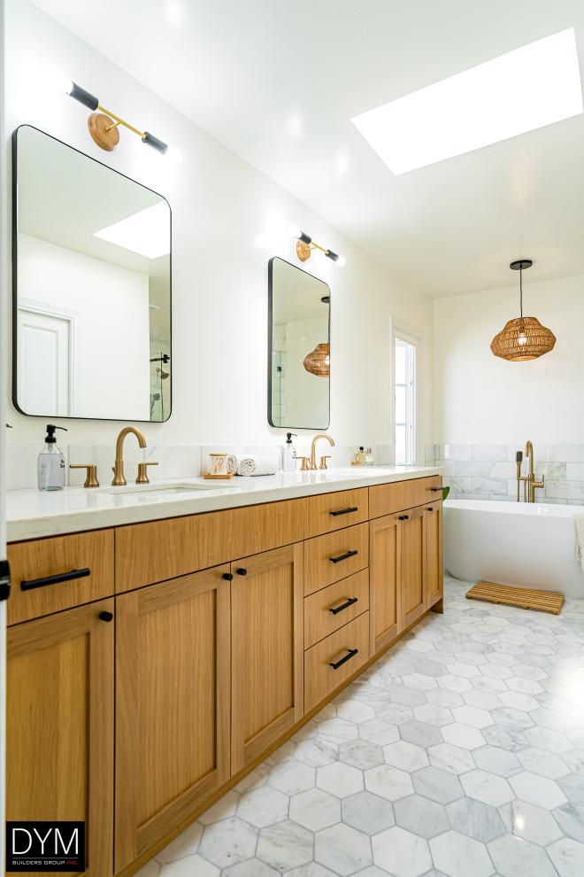 Inspiration for a large 1950s master white tile and cement tile porcelain tile, gray floor, double-sink, wallpaper ceiling and wallpaper bathroom remodel in Los Angeles with shaker cabinets, medium tone wood cabinets, a one-piece toilet, white walls, a drop-in sink, marble countertops, white countertops and a built-in vanity