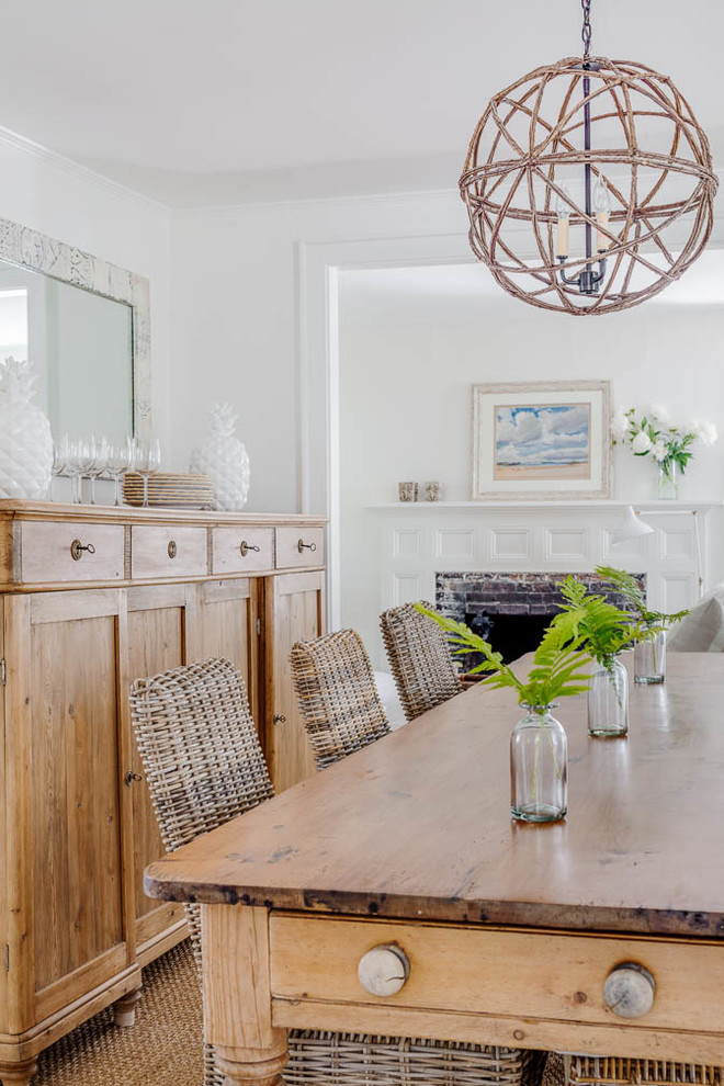 Enclosed dining room - small shabby-chic style medium tone wood floor and brown floor enclosed dining room idea in Boston with white walls