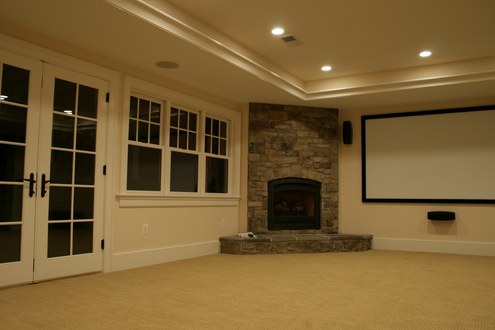 This is an example of an arts and crafts basement in DC Metro with a corner fireplace.