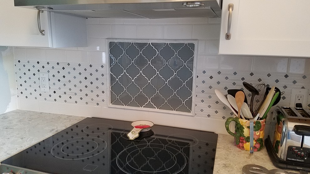 Example of a small transitional kitchen design in Detroit with white backsplash and subway tile backsplash