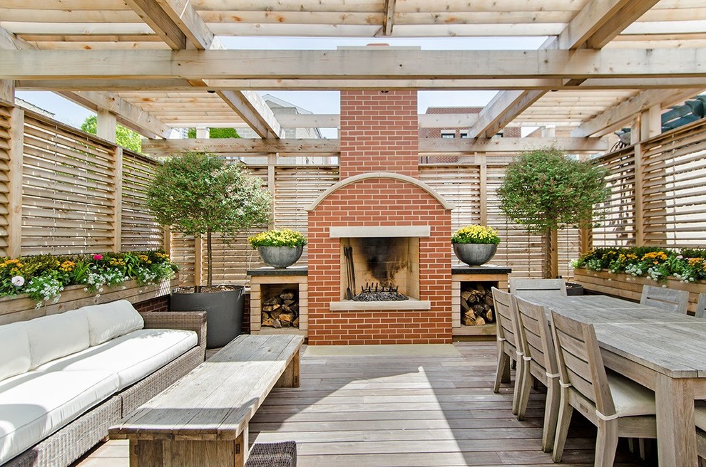 Inspiration for a traditional deck in Chicago with a pergola.