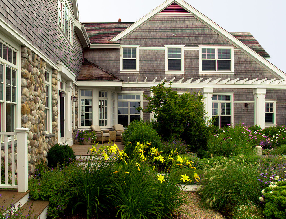 Photo of a traditional exterior in Boston with wood siding.