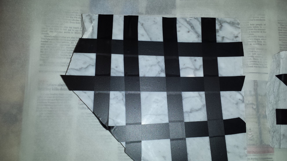 Etching tests on marble, quartzite, and granite