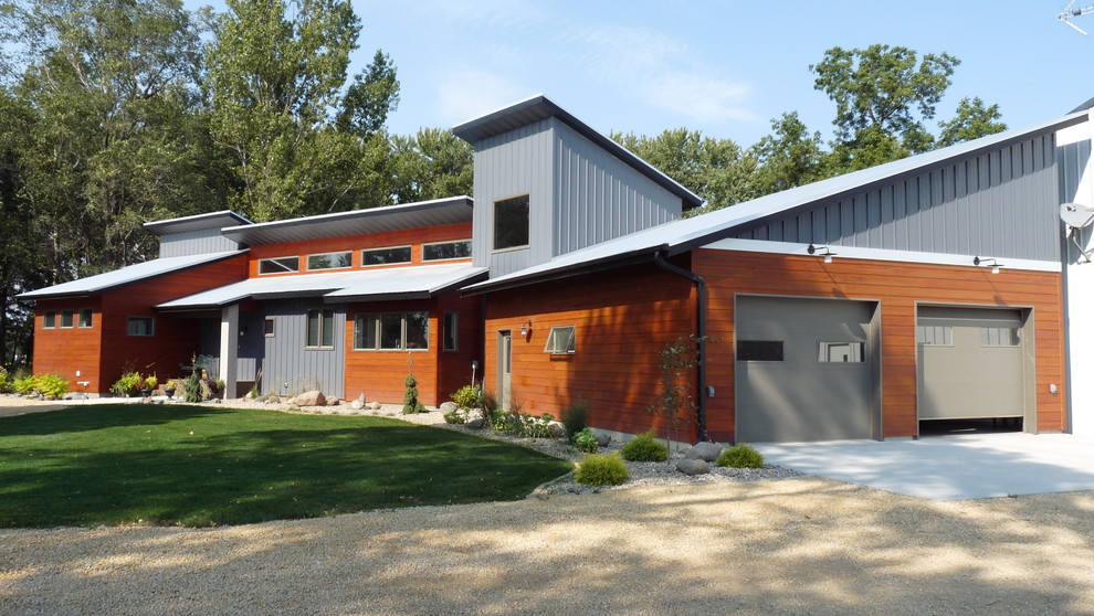 This is an example of a contemporary exterior in Minneapolis with metal siding.