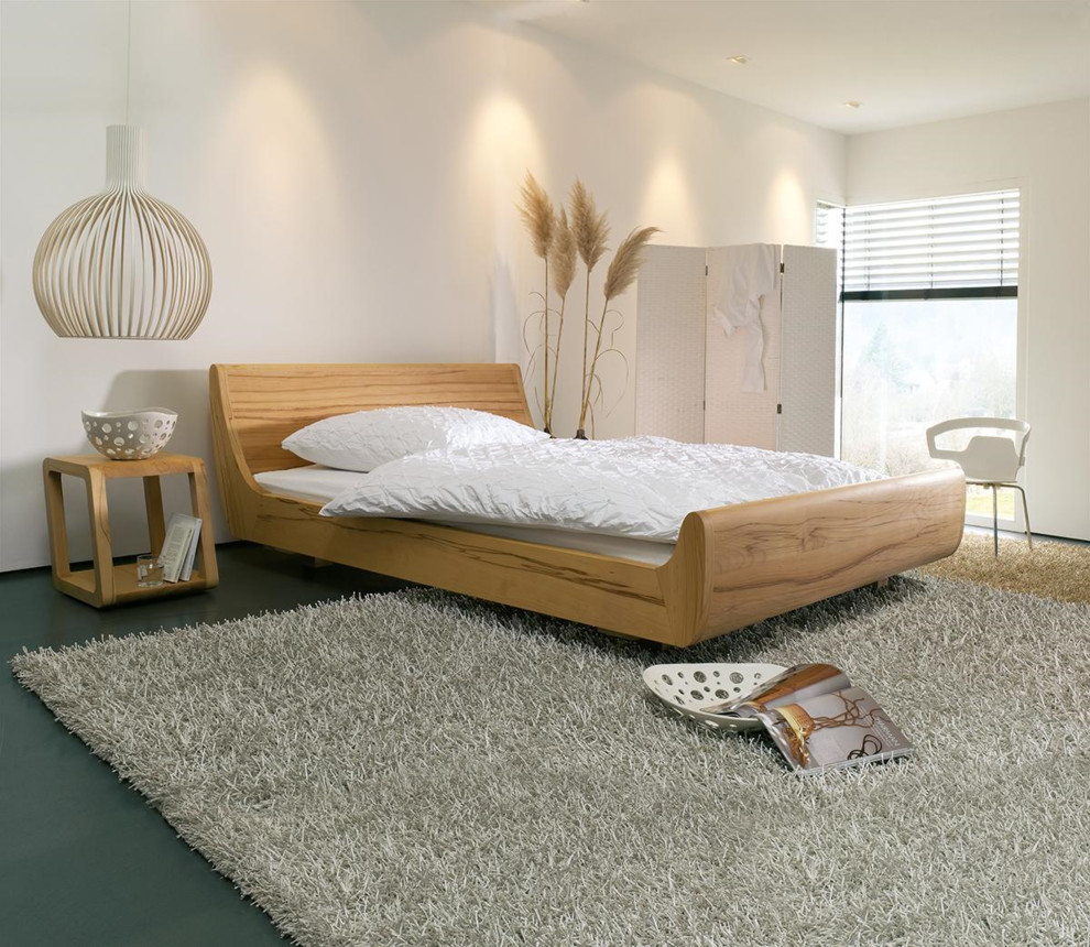 Mittelgroßes Modernes Gästezimmer ohne Kamin mit weißer Wandfarbe, grauem Boden und Vinylboden in Bremen