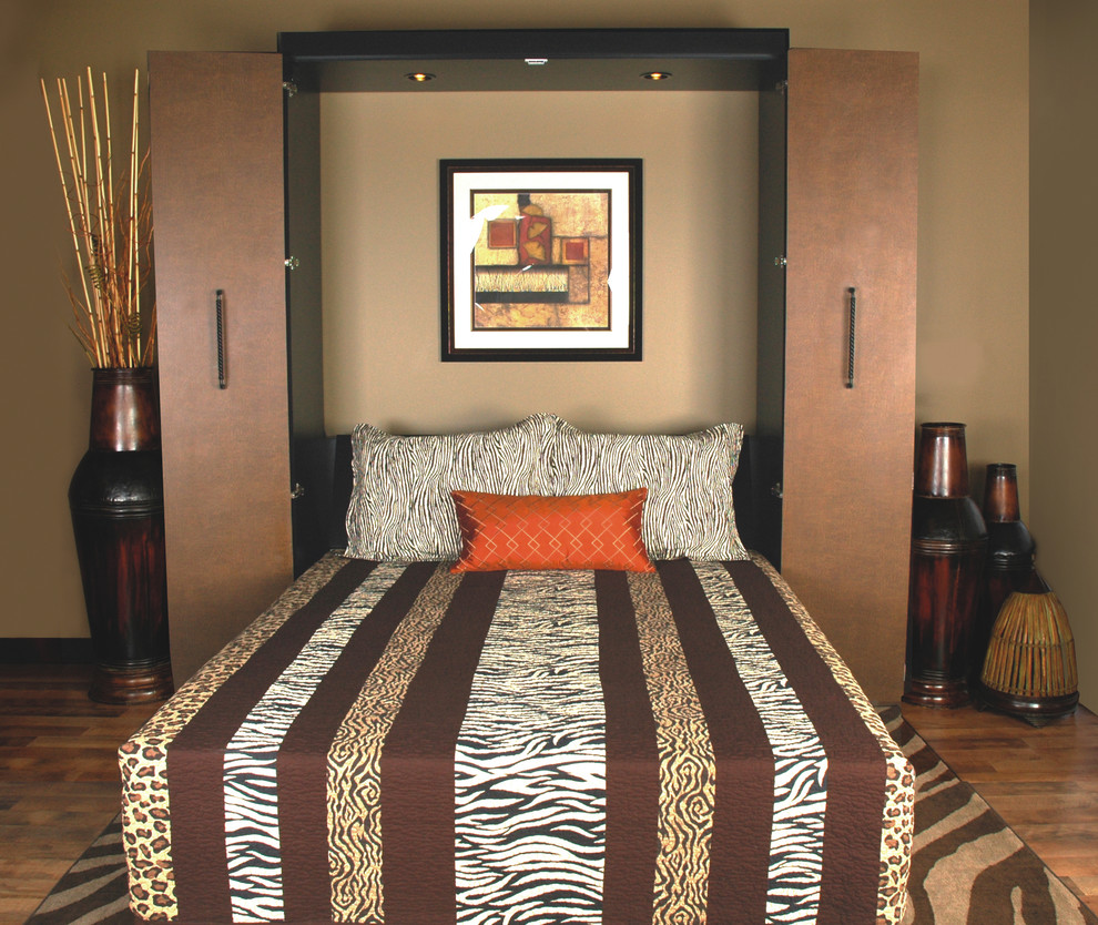 Inspiration for a mid-sized transitional guest medium tone wood floor and brown floor bedroom remodel in Miami with brown walls and no fireplace
