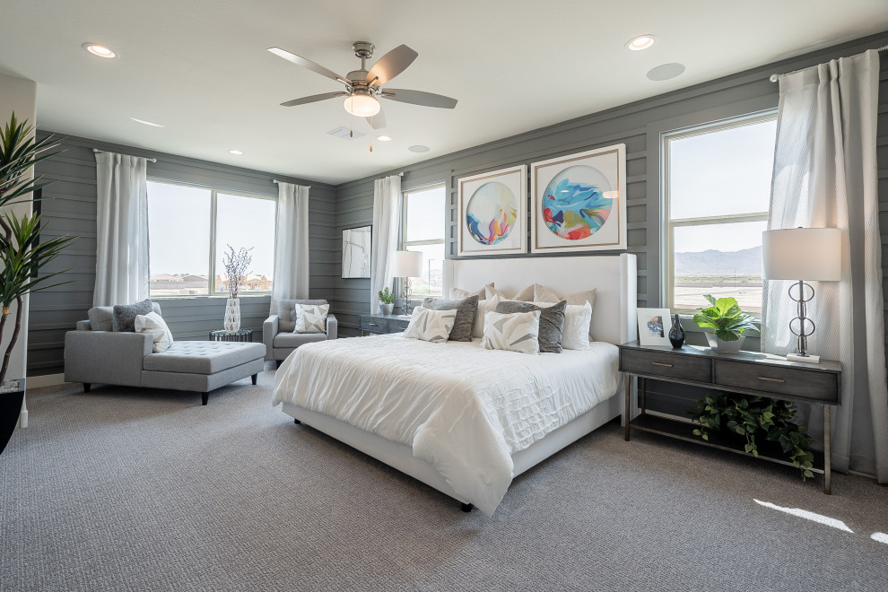 Photo of a large contemporary master bedroom in Phoenix with grey walls, carpet, grey floor and panelled walls.