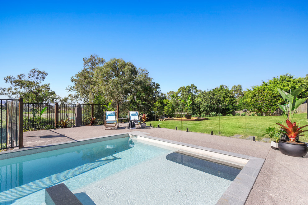 Photo of a contemporary pool in Brisbane.