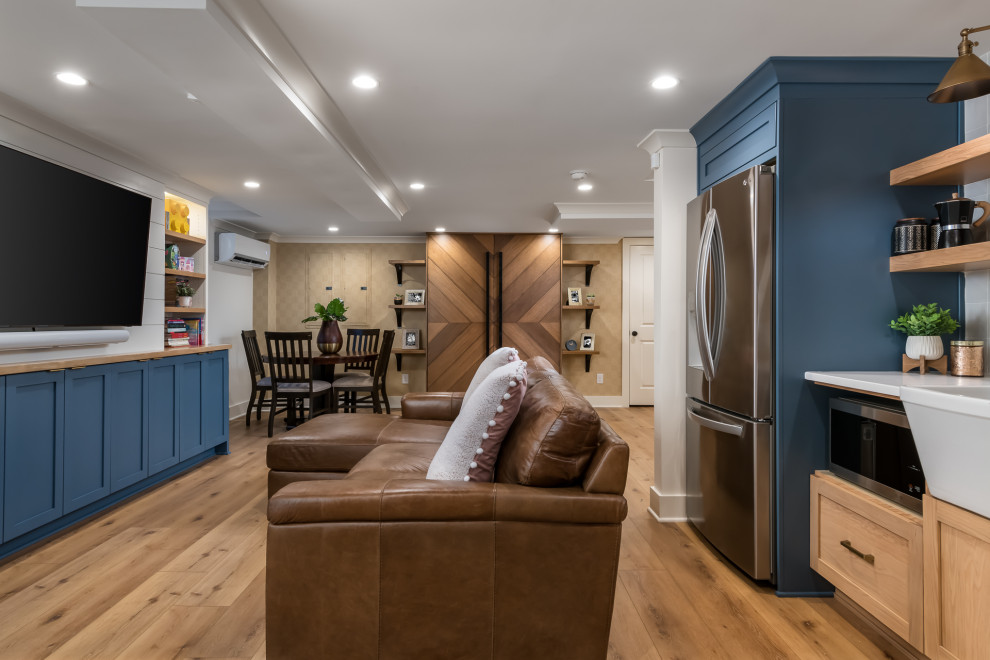 Inspiration for a large traditional walk-out basement in Atlanta with a home bar, white walls, vinyl flooring, beige floors and wallpapered walls.