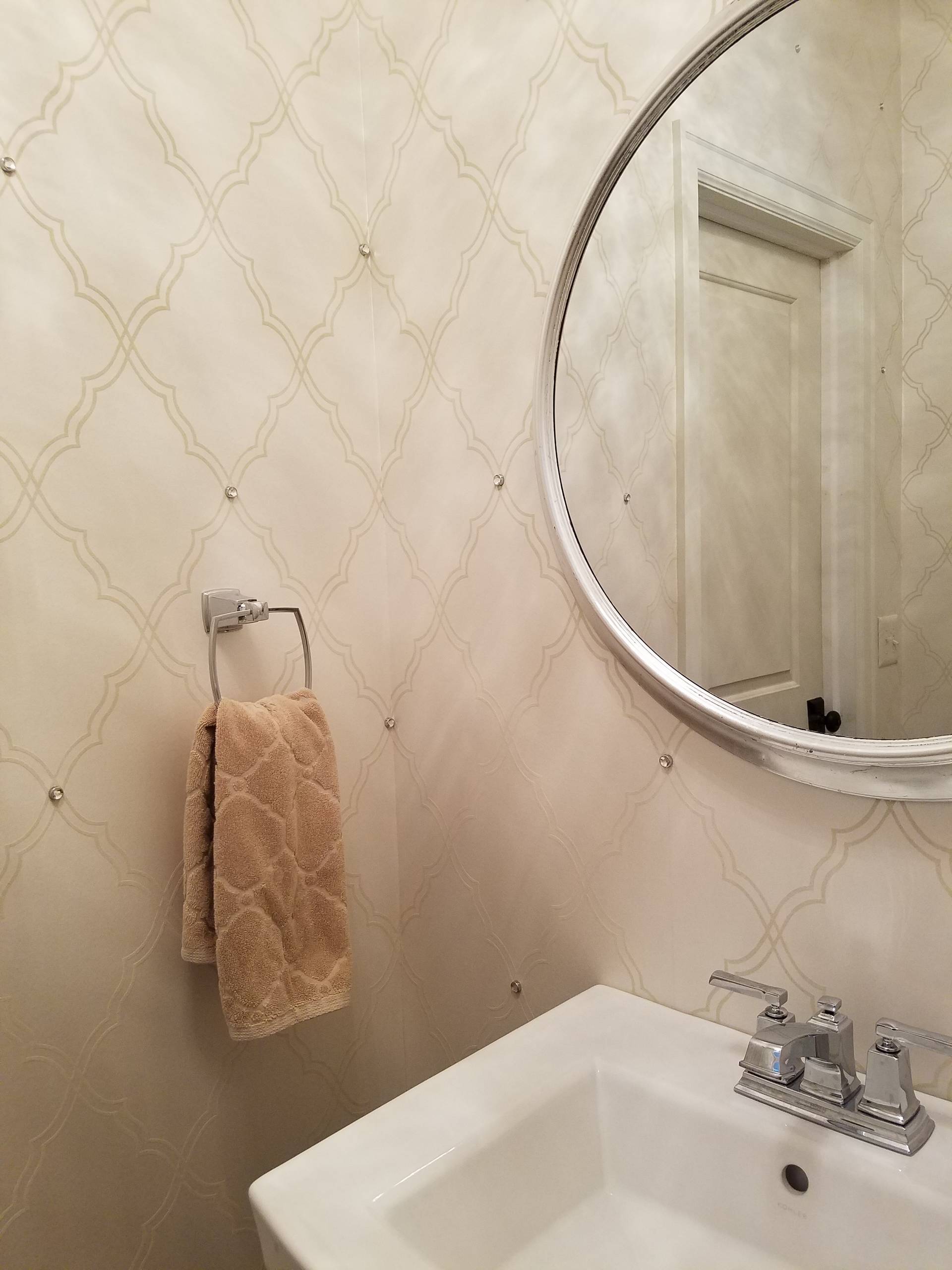 Wallpaper Install:Textural quatrefoil papered bathroom