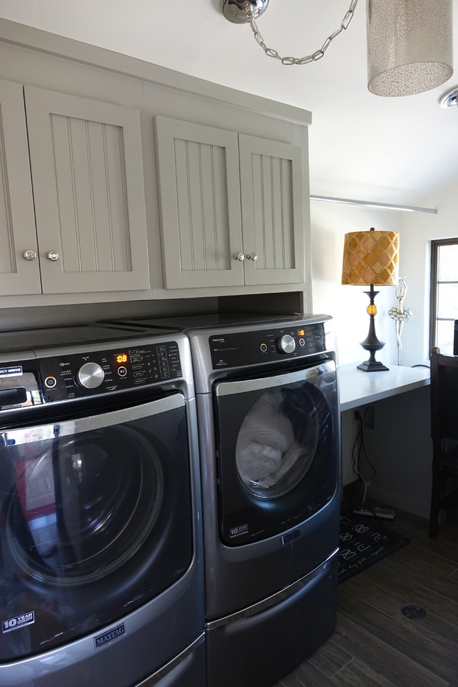 Example of a tuscan laundry room design in Los Angeles