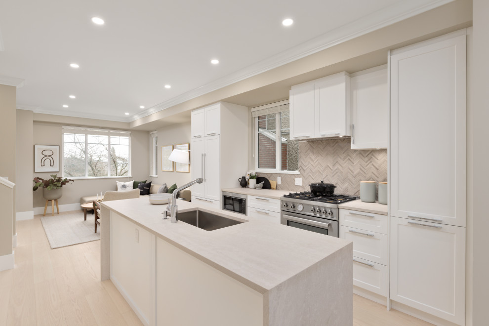 Example of a transitional kitchen design in Vancouver
