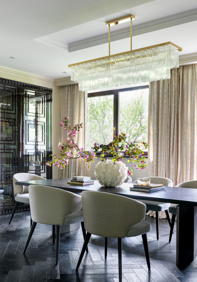 Transitional dining room in Moscow with beige walls, dark hardwood floors and black floor.