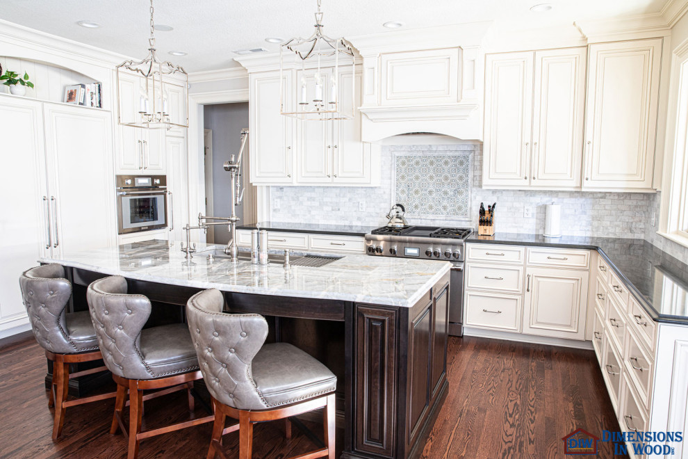 Example of a large classic dark wood floor open concept kitchen design in Other with a single-bowl sink, raised-panel cabinets, white cabinets, quartzite countertops, white backsplash, subway tile backsplash, stainless steel appliances, an island and white countertops