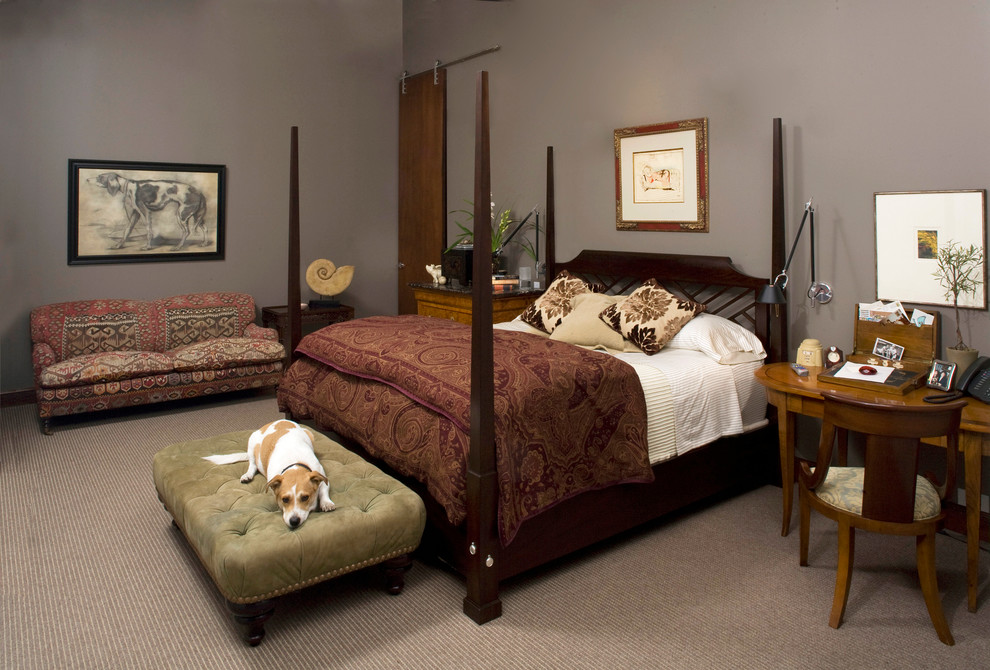 This is an example of a traditional bedroom in Dallas with grey walls.