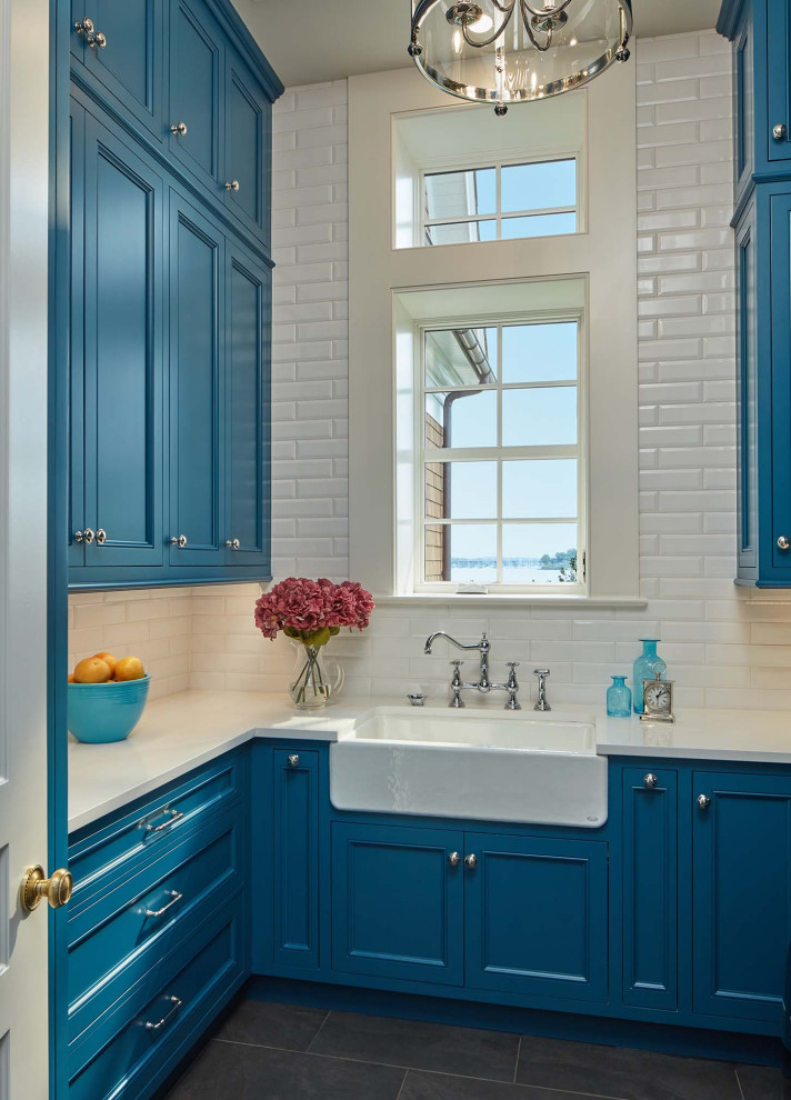 Beach style laundry room in Baltimore.