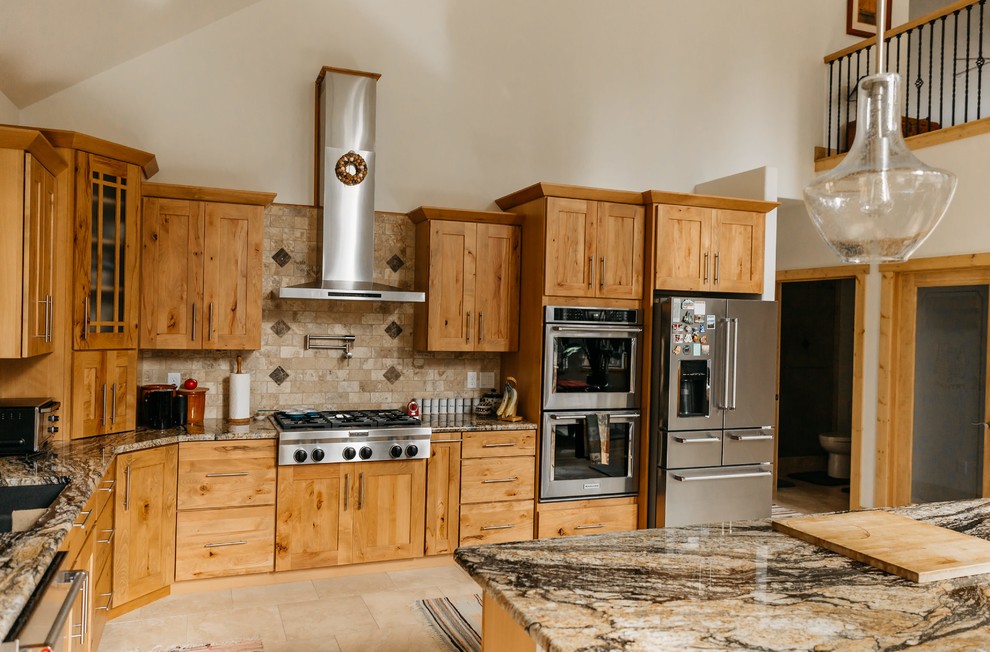 Example of a mountain style kitchen design in Denver