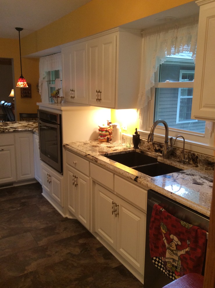 Inspiration for a huge kitchen remodel in Minneapolis with an undermount sink and stainless steel appliances