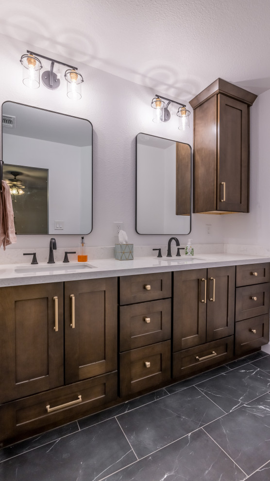 Design ideas for a large contemporary master bathroom in Phoenix with shaker cabinets, medium wood cabinets, gray tile, grey walls, porcelain floors, an undermount sink, engineered quartz benchtops, black floor, white benchtops, a double vanity and a built-in vanity.