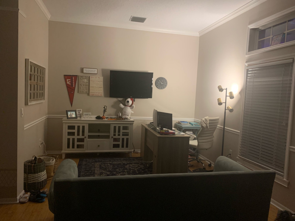 Home office ideas with TV and couch