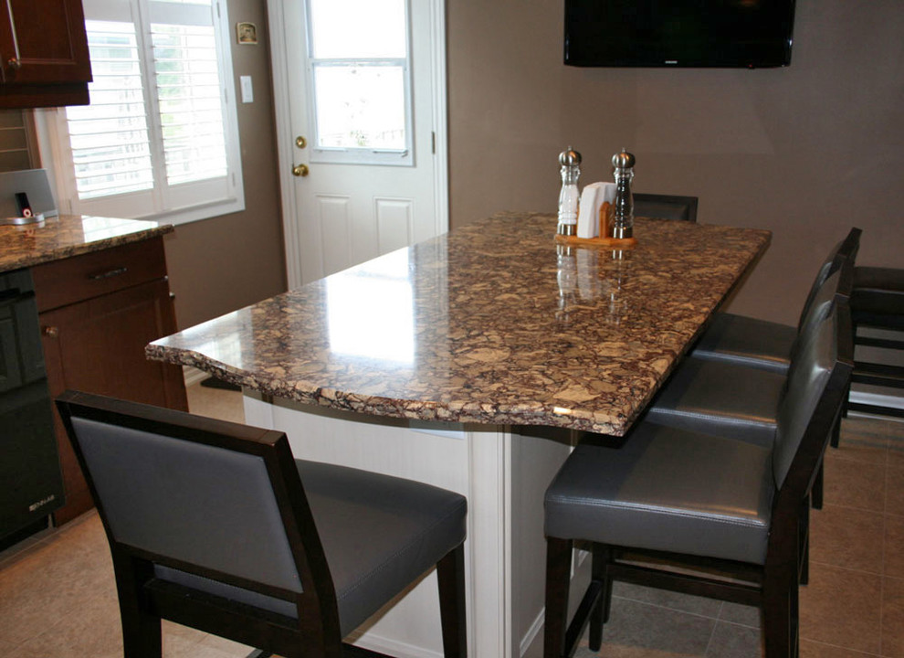 Mid-sized transitional l-shaped linoleum floor enclosed kitchen photo in Toronto with an undermount sink, shaker cabinets, medium tone wood cabinets, quartz countertops, gray backsplash, ceramic backsplash, black appliances and an island