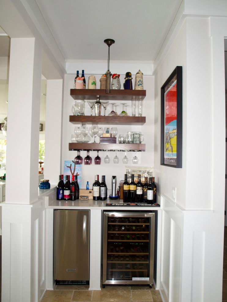 Transitional single-wall wet bar in Charlotte with open cabinets, dark wood cabinets and solid surface benchtops.