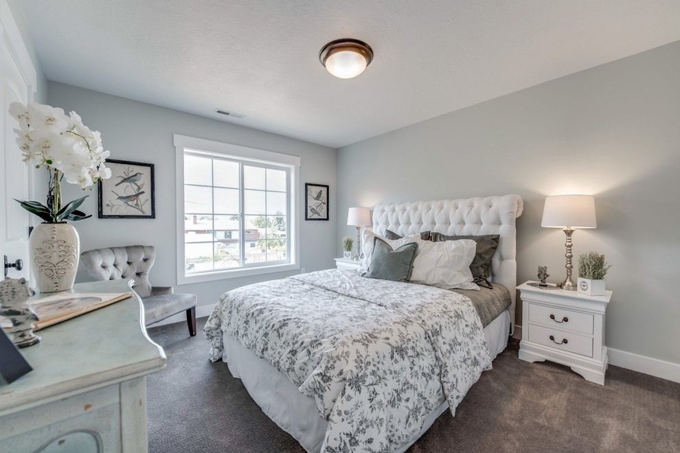 Traditional master bedroom in Salt Lake City with grey walls and carpet.