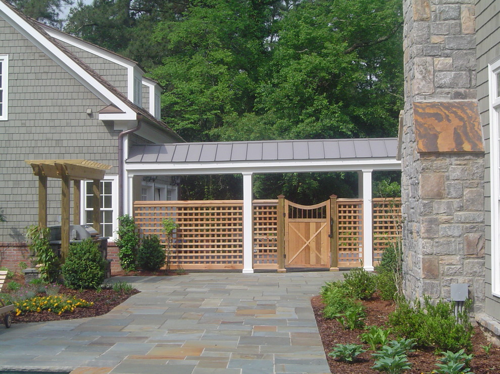 Inspiration for a large contemporary gray two-story wood exterior home remodel