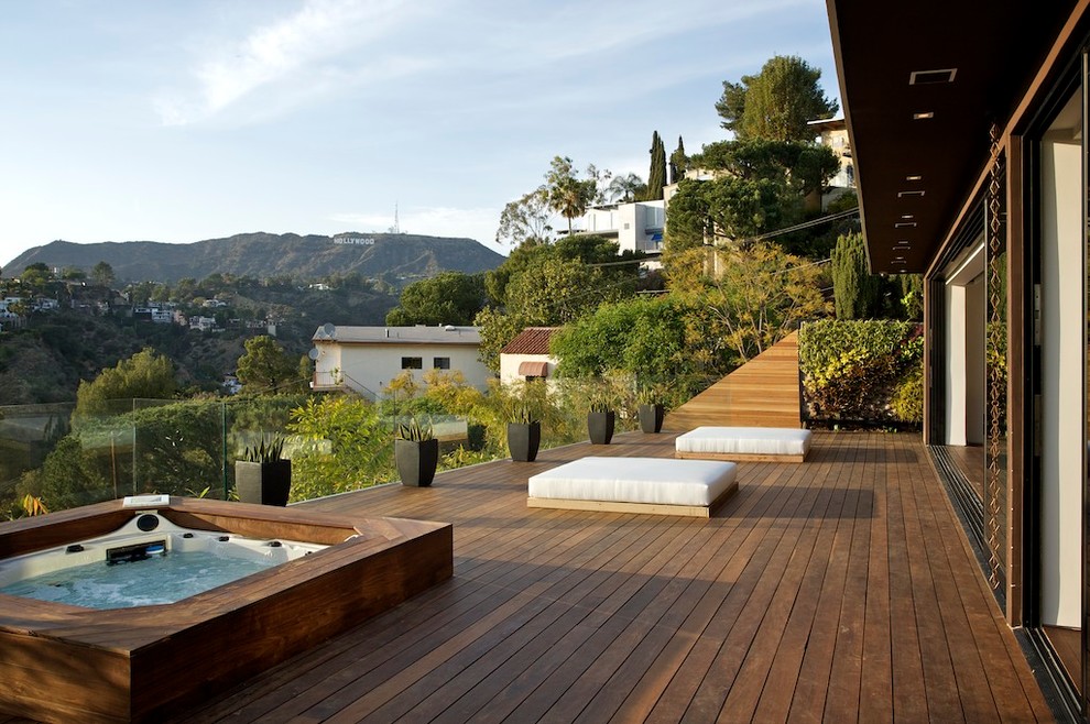 Contemporary patio in Los Angeles with decking and no cover.