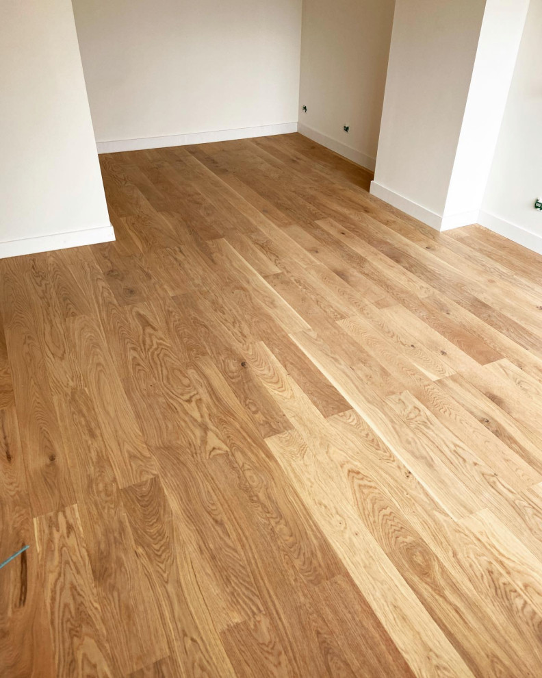 Pose d’un parquet collé en lame