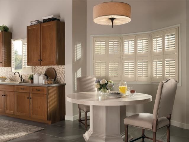 Mid-sized transitional ceramic tile and gray floor kitchen/dining room combo photo in Miami with beige walls and no fireplace