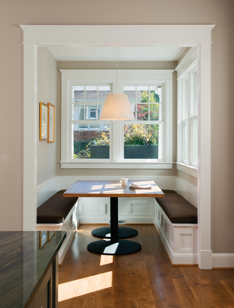 Design ideas for a traditional dining room in Other with beige walls, medium hardwood floors and brown floor.