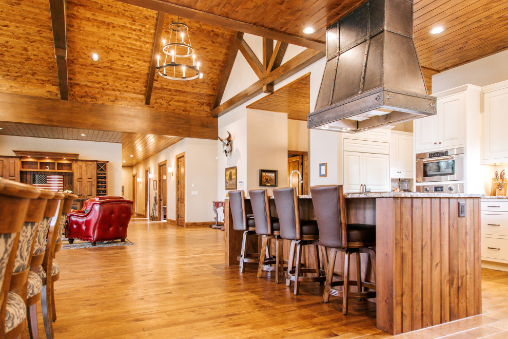 Mountain style home design photo in Denver
