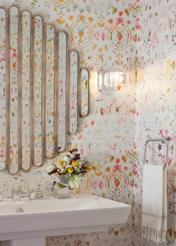 Inspiration for a contemporary powder room in Chicago with a pedestal sink and multi-coloured walls.
