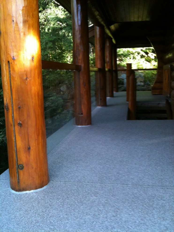 Deck - mid-sized rustic side yard deck idea in Vancouver with a roof extension