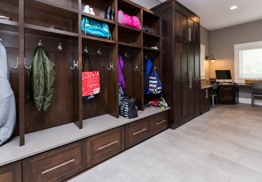 Inspiration for a mid-sized transitional mudroom remodel with gray walls