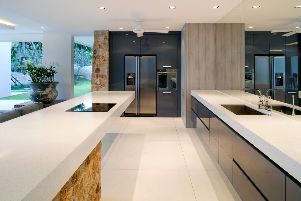 This is an example of a contemporary kitchen in Sussex.