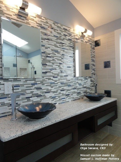 Photo of a mid-sized contemporary bathroom in Boston with a vessel sink, glass-front cabinets, dark wood cabinets, quartzite benchtops, a curbless shower, a one-piece toilet, brown tile, wood-look tile, blue walls and porcelain floors.