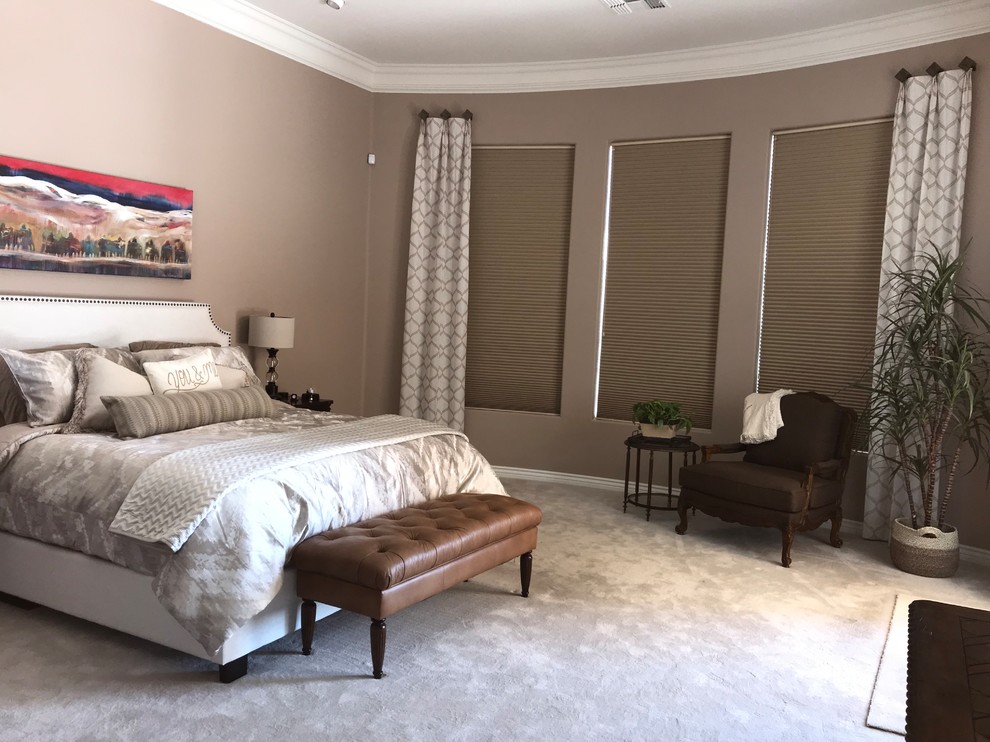 Small traditional master bedroom in Phoenix with beige walls, carpet and beige floor.