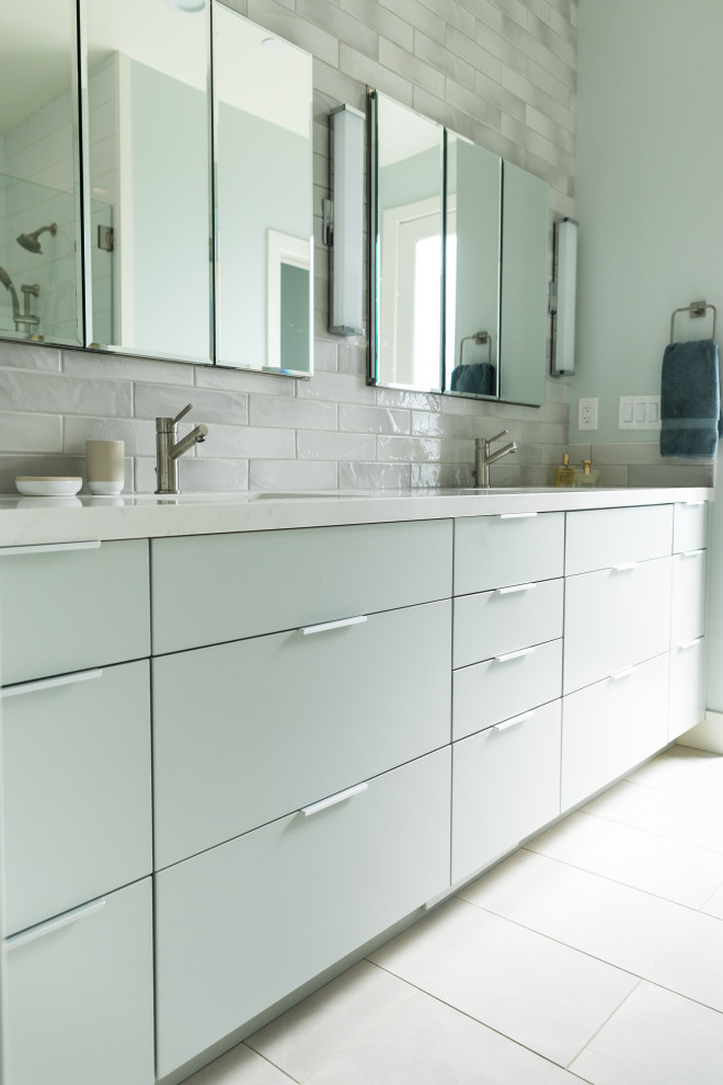 Bathroom - mid-sized modern master gray tile and ceramic tile porcelain tile, gray floor and double-sink bathroom idea in San Francisco with flat-panel cabinets, blue cabinets, blue walls, an undermount sink, quartz countertops, white countertops and a built-in vanity