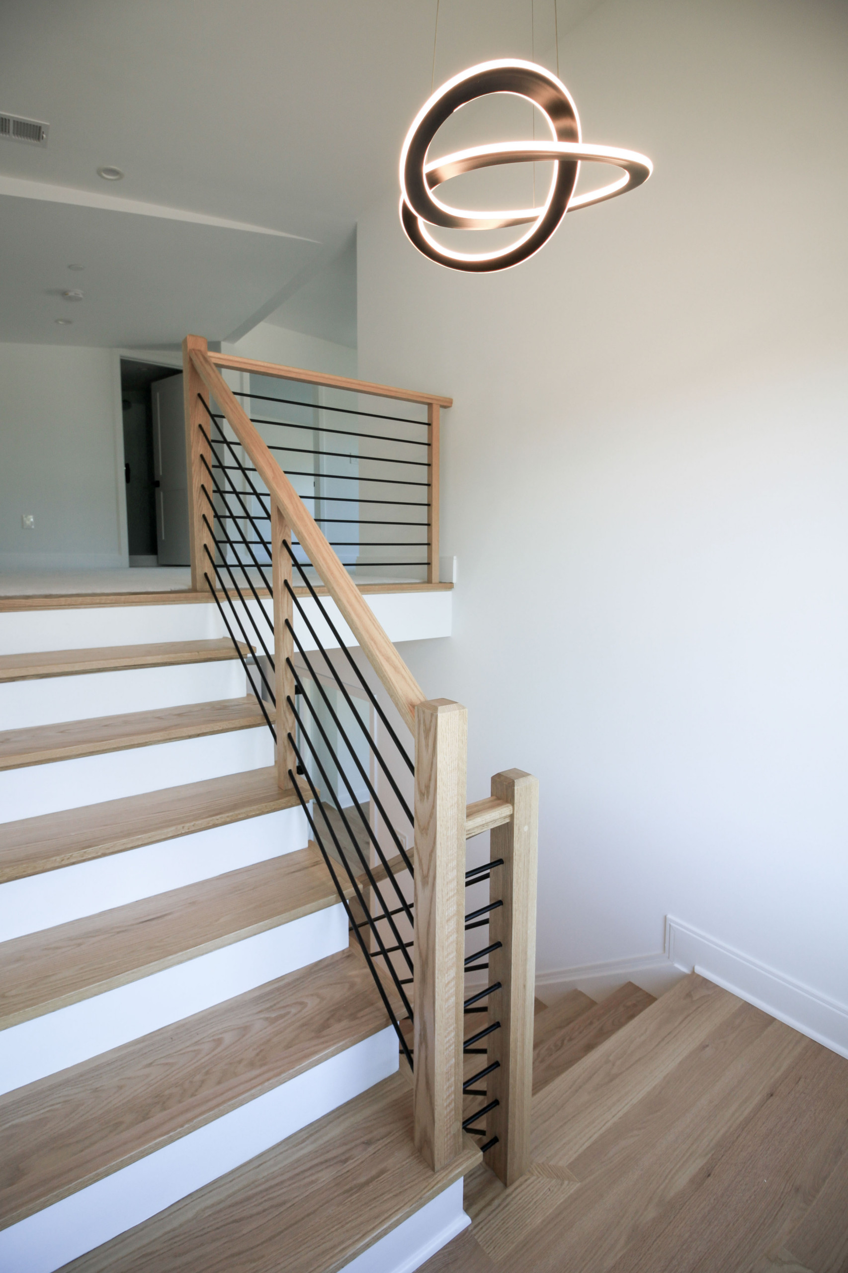 94_Neutral Color Floating Staircase with Metal Balusters, Bethesda MD 20817