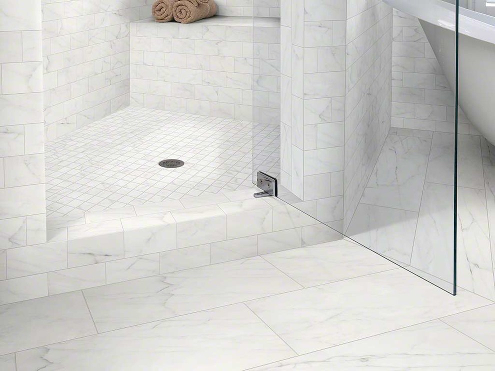 Inspiration for a transitional master white tile and marble tile marble floor and white floor freestanding bathtub remodel in Phoenix with white walls and a hinged shower door