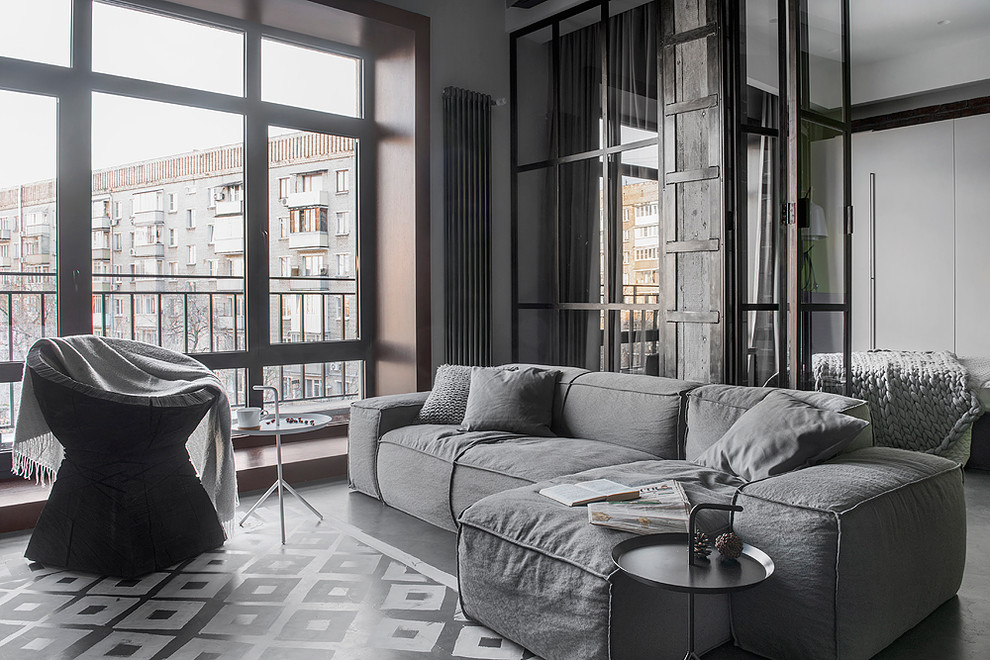 Design ideas for a small industrial formal open concept living room in Moscow with grey walls.