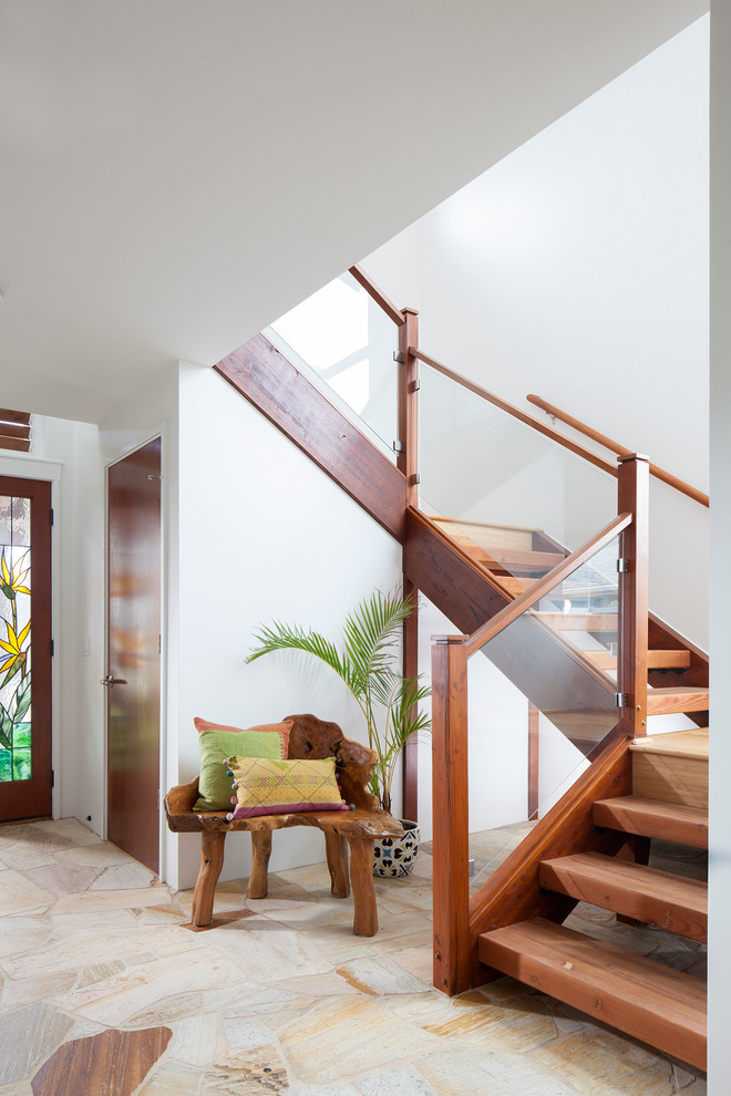 Inspiration for a contemporary wood staircase in Hawaii with open risers.