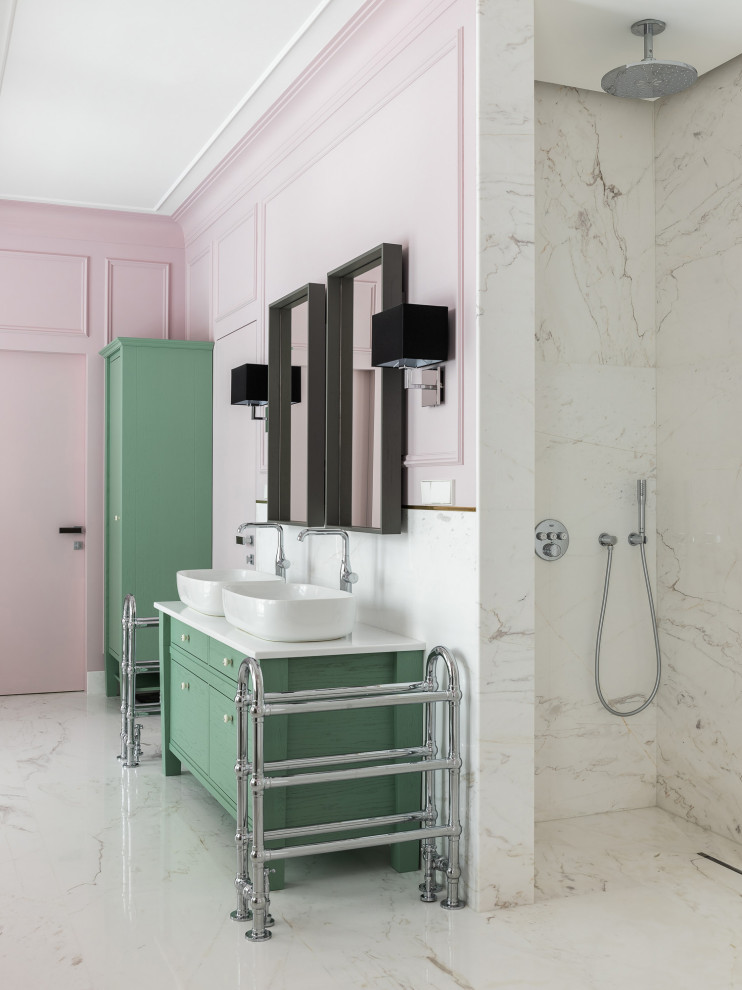 Photo of a contemporary 3/4 bathroom in Other with green cabinets, a curbless shower, white tile, pink walls, a vessel sink, white floor, white benchtops, a double vanity and a freestanding vanity.