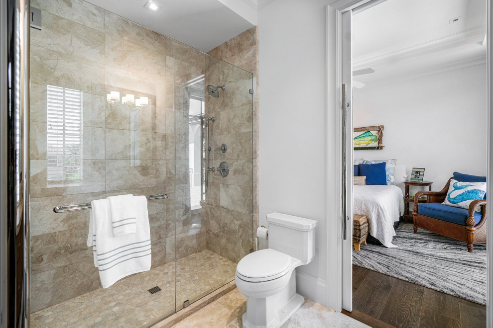 Photo of a large beach style bathroom in Miami with shaker cabinets, medium wood cabinets, marble floors, an undermount sink, quartzite benchtops, a hinged shower door, multi-coloured benchtops, a single vanity, a built-in vanity, coffered and wood walls.