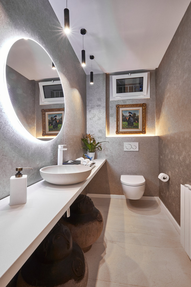 Photo of a small contemporary powder room in Other with open cabinets, white cabinets, porcelain floors, a vessel sink, laminate benchtops and white benchtops.