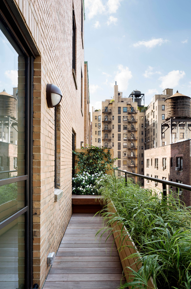 Inspiration for a mid-sized contemporary balcony in New York with no cover.