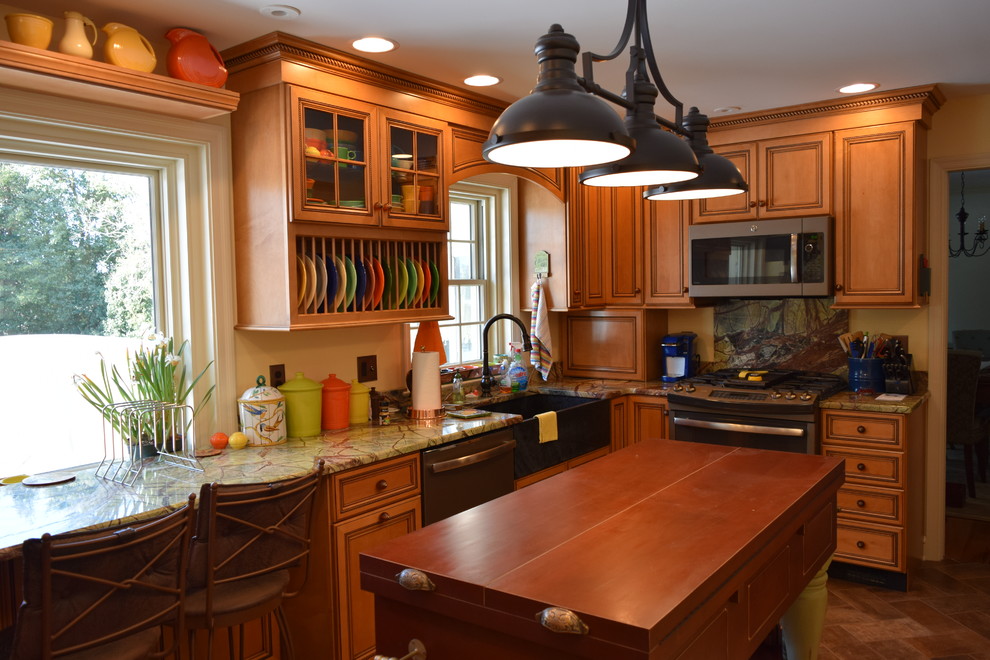 Transitional porcelain tile kitchen photo with recessed-panel cabinets, medium tone wood cabinets, granite countertops, colored appliances and an island