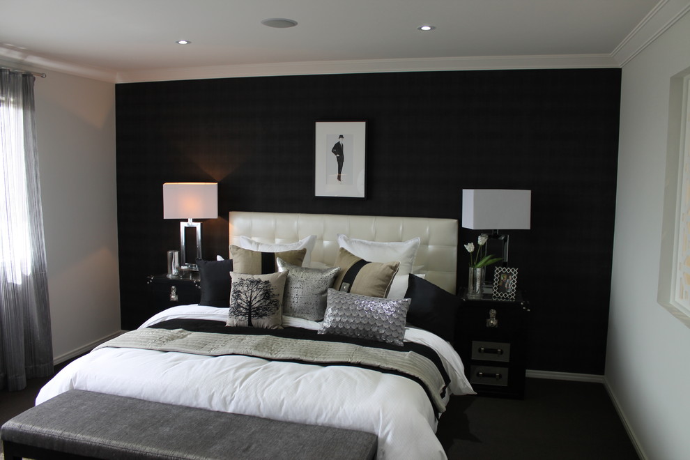 This is an example of a contemporary bedroom in Brisbane.
